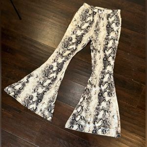 Bell bottom snake leggings/pants. High waisted. Super flared